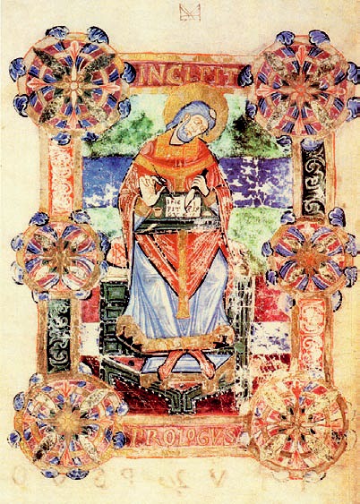 Gemalte Darstellung des Venantius Fortunatus, Bischof von Poitiers im 6. Jh., wie er eine Heiligenvita in lateinischer Sprache mit Feder, Radiermesser und Tinte auf Pergament niederschreibt. Um das Bild sind kreisrunde schmückende Elemente und ein roter Rahmen mit Inschriften gesetzt. 